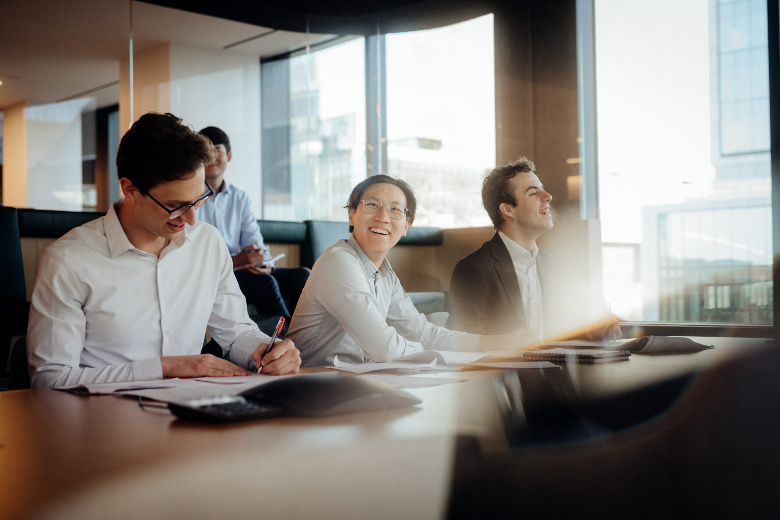 point72 interns at office conference table
